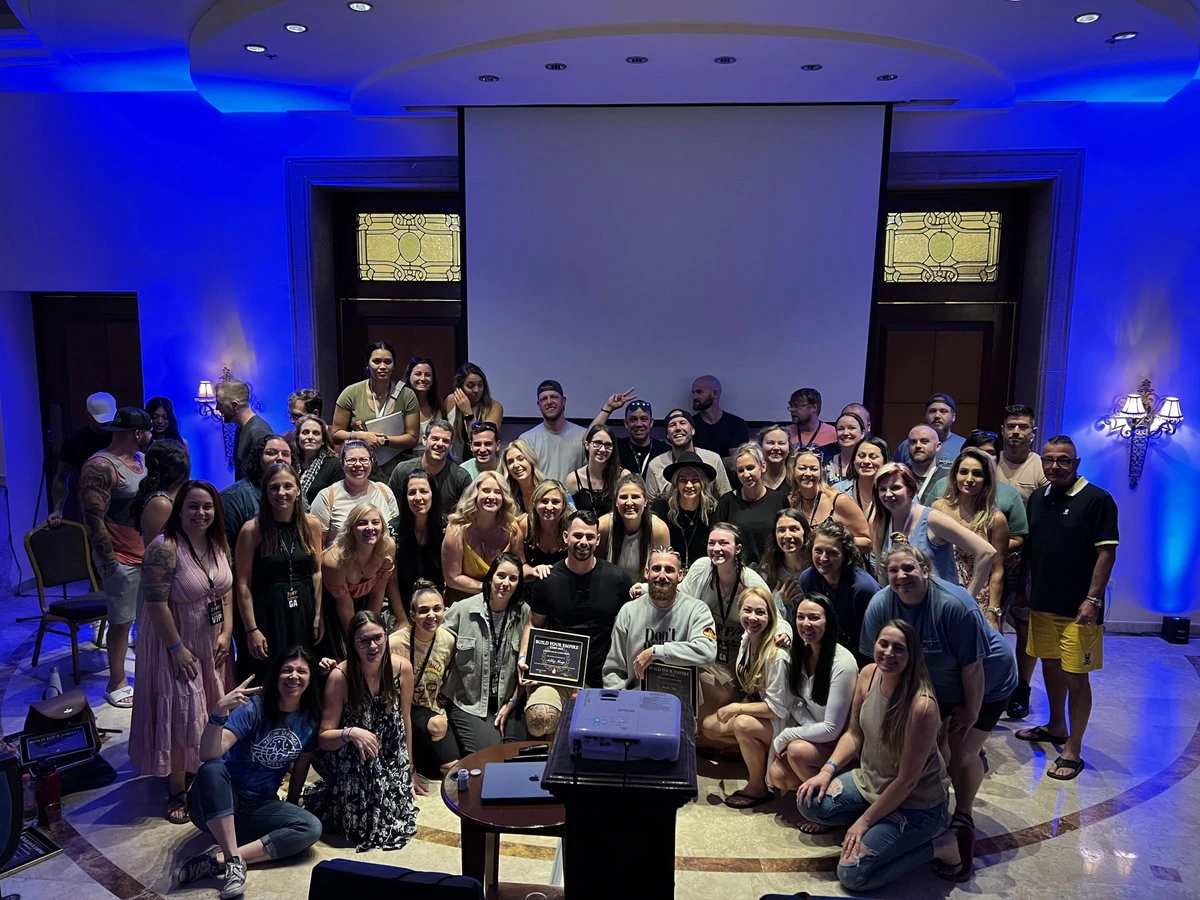 A large group of Online Empires members together at a community event